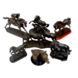 Seven bronze effect and resin equine sculptures, including a bronzed metal Marly horse, 22 by 9 by