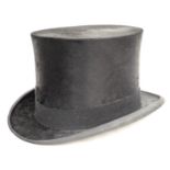 A vintage black silk top hat, by Lincoln Bennett & Co, London, marked for the original owner, 'D. L.