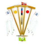 A Townsend croquet set, circa 1990, in damaged cardboard box, with four mallets, two plastic