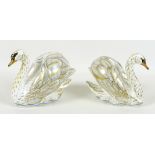 A pair of Royal Crown Derby commemorative paperweights, modelled as 'The Royal Swans', 'William' and