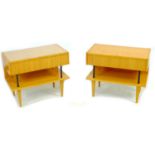 A pair of vintage 1950's tables, of modernist design, with glossy blonde veneer throughout, the tops