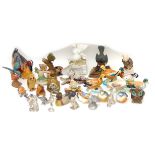 A collection of over thirty bird figurines, including five Brixworth Pottery ducks, largest 12.5