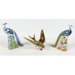 A group of three Royal Crown Derby paperweights, all modelled as birds, comprising 'Derby