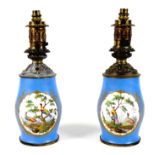 A pair of Sevres style table lamps, 19th century, each porcelain base decorated with an oval reserve
