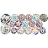 A group of Chinese dishes and plates, 18th and 19th century, mostly decorated in Imari palettes.