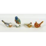 A group of four Royal Crown Derby paperweights, all modelled as birds, comprising 'Bluebird', issued