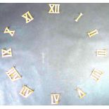 A group of Victorian or Edwardian clock golf cast iron Roman numerals,
