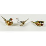 A group of three Royal Crown Derby paperweights, all modelled as birds, comprising a pair 'The Brace