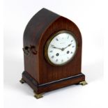 An Edwardian Maple and Co. Ltd. mahogany cased mantel clock, of lancet form with boxwood edging