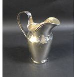 An early 19th century German silver jug, with wide lip, loop handle, and slender decorative borders,