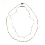 A cultured pearl necklace, the ninety-nine graduated pearls measuring 4.5 to 7.7mm diameter, with