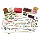A large group of 19th and 20th century silver and costume jewellery, including a silver chain, the