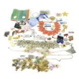 A large selection of costume jewellery, mostly 20th century, including an art glass bead necklace,