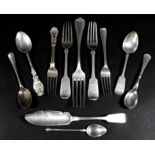 A collection of Victorian and later silver flatware, including fiddle pattern dessert forks, William