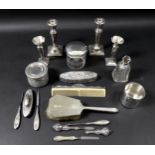 A collection of silver dressing table items, including a cylindrical glass dressing table pot, the