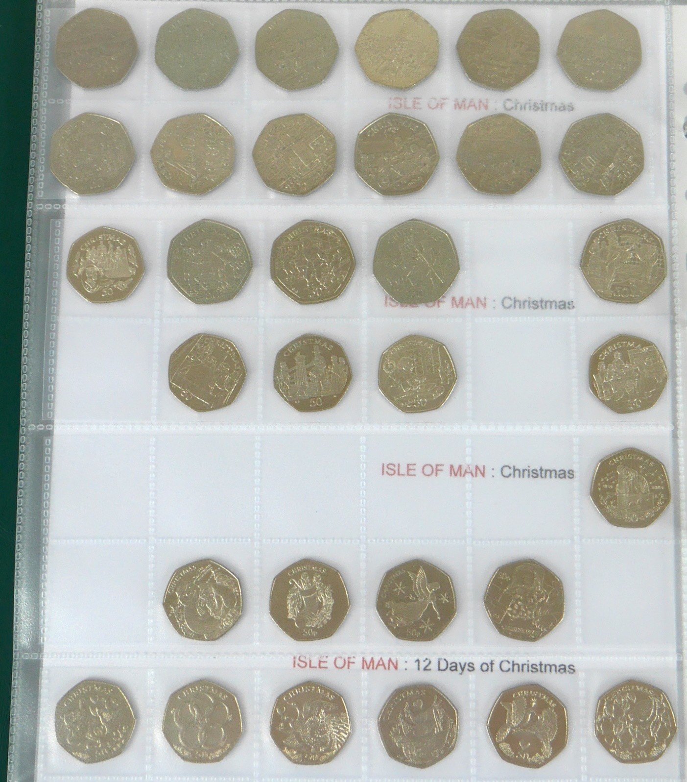 A collection of three albums comprising coins of the Isle of Man, including Christmas 50p coins, - Image 13 of 13