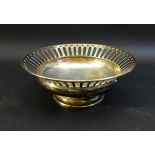 An Edwardian silver circular bowl, pierced arch band to rim and stepped foot, Matin Hall and Co,