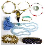 A selection of 20th century costume jewellery, including a gilt metal bangle set with semi