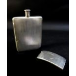 Two pieces of George VI and late silver, comprising an ERII silver hip flask, with engine turned