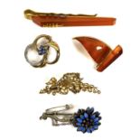 A group of mostly 20th century brooches, to include a 15ct gold and seed pearl brooch in the form of