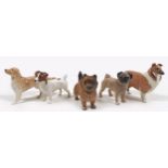 A group of five Beswick dogs, comprising 'Golden Retriever - Standing', model 3270, pale golden