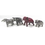 A group of elephants figurines, including a Beswick 'Elephant - Trunk stretching - small', model
