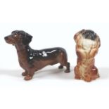 Two Beswick dog figurines, comprising 'Pekinese - Begging', model 1059, golden tan - gloss, 10.8cm