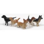 A group of five Beswick dogs, comprising 'Labrador - Small', model 1956, black - gloss, 8.3cm