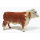 A Beswick 'Hereford Bull', model 949, red and white - gloss, 14.5cm high.