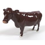 A Beswick 'Red Poll Cow', model 4111, red/brown - gloss, 16cm high, with box.