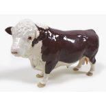 A Beswick 'Polled Hereford Bull', model 2549A, brown and white - gloss, ringed nose, 12.7cm high,