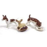 A group of three Beswick dogs, comprising 'Chihuahua - Lying on cushion', model 2454, cream dog,