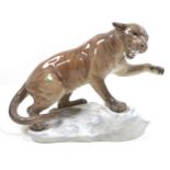 A Beswick 'Puma on Rock', Style One, model 1702, tawny - gloss, 21.6cm high.