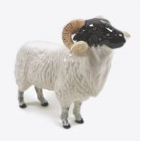 A Beswick Black-Faced Ram, model 3071, head lifted upwards, black and white - gloss, 12 cm high,