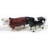 Two Beswick cows, comprising a 'Hereford Cow "Ch of Champions", facing forward, model 1360, 11.5cm