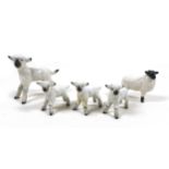 A group of Beswick lambs, comprising three small 'Lamb' figurines, model 937, white - gloss, 5cm