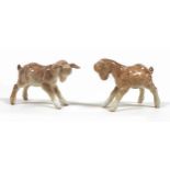 Two Beswick 'Kid' goat figurines, model 1036, tan - gloss, 6.4cm high. (2)