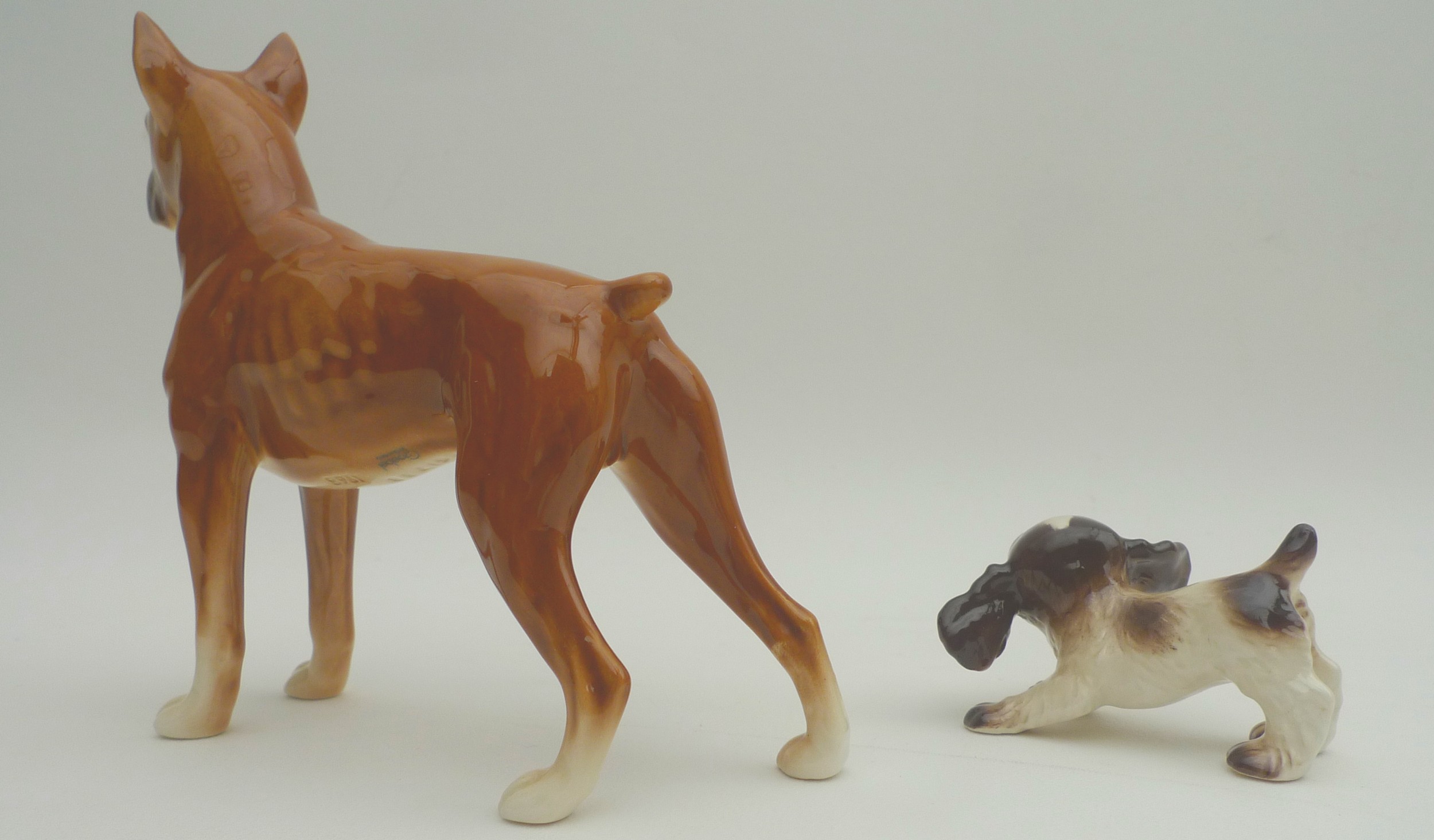 A collection of ceramic animal figurines, all modelled as dogs, some marked, including two Goebel, - Image 8 of 11