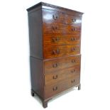 A George III mahogany tallboy chest on chest, two short over six long drawers secretaire drawer,