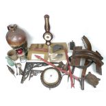 A selection of objects of social history interest, including a fragment of a bell from Great