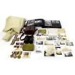 A collection of WWI and later militaria including a photograph album with 1930s scenes