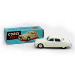 A Corgi Toys die-cast model Jaguar 2.4 litre Saloon, in white, with original box. Play worn with