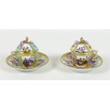 A pair of Dresden porcelain demi-tasse cups, covers, and saucers, late 19th century, one with pink