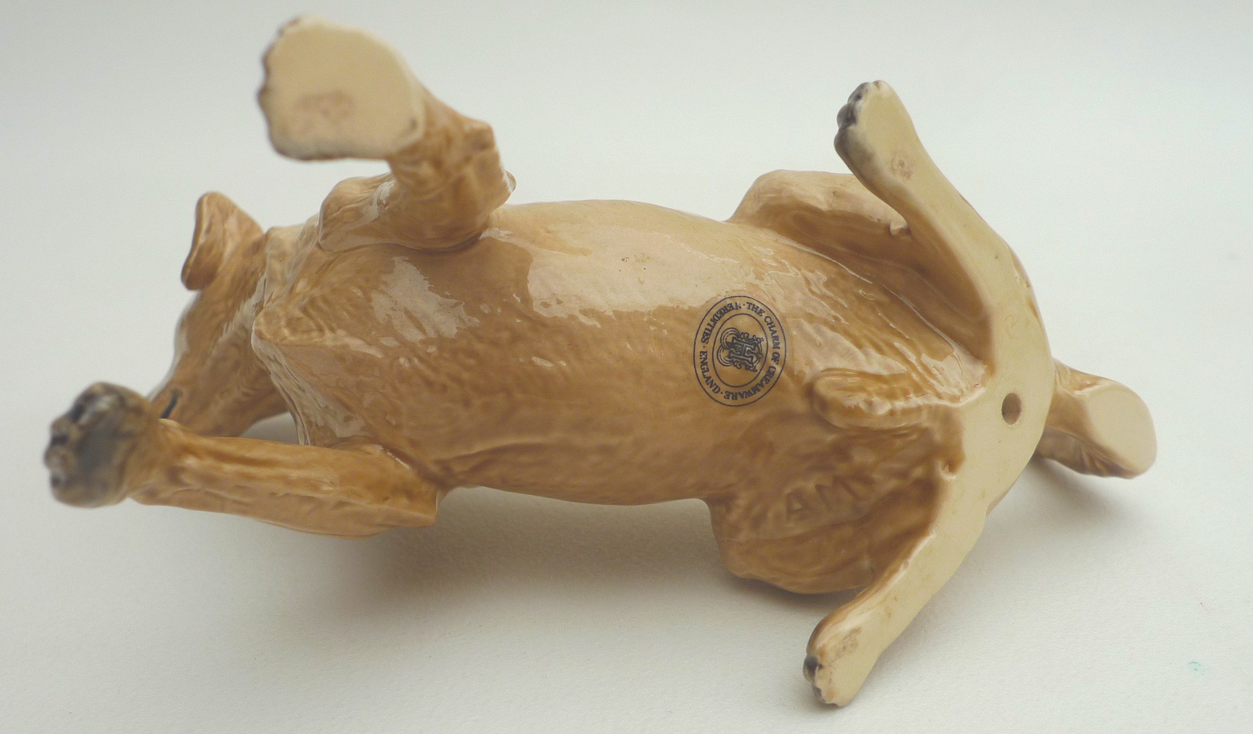 A collection of ceramic animal figurines, all modelled as dogs, some marked, including two Goebel, - Image 4 of 11