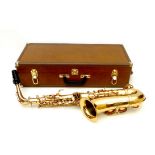 An Earlham Professional Series II alto saxaphone, number 9806495, 67cm long, in fitted case, 63 by