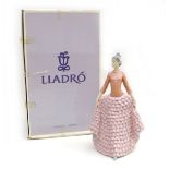 A Lladro Fiesta dancer, with maker's marks and impressed number '6163' to its base, 18 by 16 by 31cm