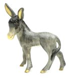 A Wedgwood & Co. Ltd ceramic figurine, modelled as a donkey in standing pose, 18.5 by 16cm long.