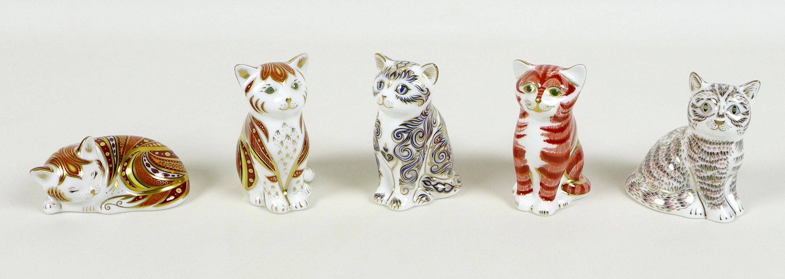 A group of five Royal Crown Derby paperweights, all modelled as cats, comprising 'Thomas', limited