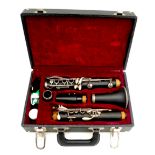 A Musical Design five piece clarinet, 67cm long, in fitted case, 33 by 20 by 10cm high.