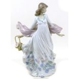 A Lladro figurine 'Spring Splendour', with maker's marks and impressed number, '5898' to its base,